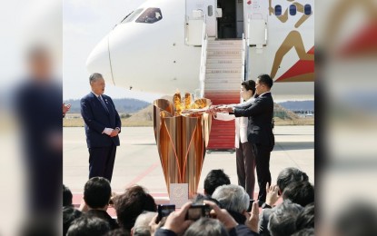 <p><strong>TOKYO OLYMPICS.</strong> Olympic gold medalists Tadahiro Nomura (far right) and Saori Yoshida (2nd from right) light up the Olympic cauldron during the Olympic flame arrival ceremony in Miyagi, Japan on March 20, 2020. The International Olympic Committee (IOC) remains "fully committed" to staging the Tokyo Olympic Games in 2021 with spectators, IOC president Thomas Bach said on Wednesday (July 15, 2020). <em>(Kyodo News/Handout via Xinhua)</em></p>