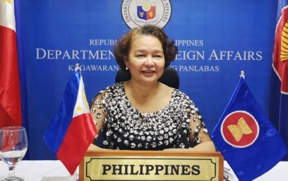 <p><strong> RECOVERY FRAMEWORK.</strong> Asean-Philippines Director General and Temporary SOM Leader of the Philippines Junever M. Mahilum-West delivers the Philippine intervention during the video conference on Asean’s Comprehensive Recovery Framework on July 14, 2020. She underscored the need to continue mitigating public health risks while strengthening economic resilience. <em>(Photo by DFA)</em></p>
<p><em> </em></p>