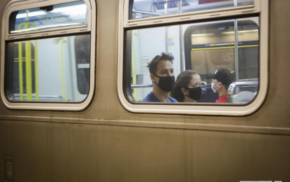 <p><strong>WEAR MASK.</strong> Passengers wearing face masks ride a SkyTrain in Vancouver, British Columbia, Canada, on July 18, 2020. As new Covid-19 cases in British Columbia continued to tick upwards, health officials urged those who can to wear a mask on transit and in other confined spaces, such as grocery stores. <em>(Photo by Liang Sen/Xinhua)</em></p>