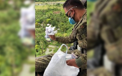 <p><strong>INFO DRIVE</strong>. The 91st Infantry (Sinagtala) Battalion of the 7th Infantry Division, Philippine Army, air drops Enhanced Comprehensive Local Integration Program (E-CLIP) leaflets in the coastal barangays of San Luis, Aurora on Sunday (July 19, 2020). The move is part of the continuing efforts to convince New People's Army (NPA) bandits to return to the fold of the law and avail programs and services of the government.<em> (Photo courtesy of the Army's 91st Infantry Battalion)<strong><br /></strong></em></p>