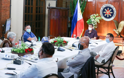<p><strong>GOD WON’T FORSAKE US</strong>. President Rodrigo Roa Duterte talks to the people after holding a meeting with the Inter-Agency Task Force on the Emerging Infectious Diseases (IATF-EID) core members at the Malago Clubhouse in Malacañang on July 21, 2020. Duterte said God won’t abandon the Filipinos amid the coronavirus disease 2019 pandemic. <em>(Presidential photo by Albert Alcain)</em></p>