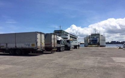 <p><strong>PORT OF CALL</strong>. Roll-on, roll-off vessels bound for Iloilo have resumed trips from Bredco port after Mayor Evelio Leonardia ordered the reopening of the borders of Bacolod City to travelers from Iloilo City, Iloilo Province and the rest of Panay island on Wednesday afternoon (July 22, 2020). Photo shows cargo trucks stranded in Bacolod on Wednesday morning. <em>(Photo courtesy of Philippine Coast Guard-Negros Occidental)</em></p>