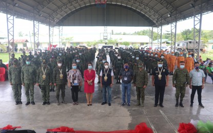 <p><strong>DEPLOYMENT. </strong>Key government officials during the send-off ceremony of teams on Wednesday at the Basey National High School Gymnasium. Government troops have deployed its retooled community support program (RCSP) teams in Basey, Samar in the bid to identify issues and concerns in remote communities threatened by the New People’s Army. <em>(Photo courtesy of Philippine Army 63rd Infantry Battalion)</em> </p>
