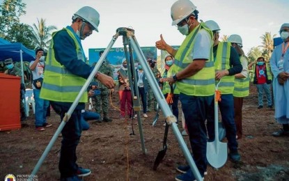 <p><strong>BREAKING GROUND.</strong> Bangsamoro Autonomous Region in Muslim Mindanao Public Works Minister Architect Eduard Guerra (right) and Basilan Governor Jim Hataman during the groundbreaking ceremony for the construction of a 100-bed capacity isolation facility in the province on Thursday (July 23, 2020). Three more isolation facilities are up for construction in Sulu, Tawi-Tawi, and Lanao del Sur to accommodate the increasing number of homecoming locally stranded individuals and returning overseas Filipinos in the region. <em>(Photo courtesy of BPI-BARMM)</em></p>