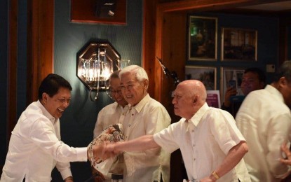 <p><strong>FAREWELL. </strong>Labor Secretary and former government peace panel chair Silvestre Bello III (left) shakes hands with NDF chief negotiator Fidel Agcaoili (right) at the opening ceremony of the resumption of the GPH-NDF peace talks in Oslo, Norway in August 2016. Bello mourned the passing of Agcaoili whom he described as a "man of honor and conviction". <em>(Photo courtesy of OPAPP) </em></p>