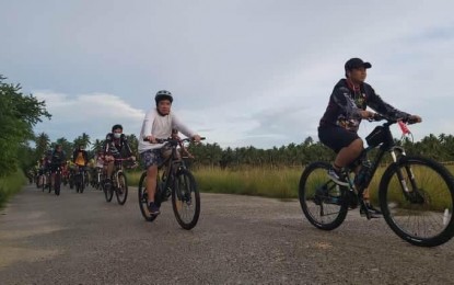 <p><strong>BIKE-FRIENDLY ROAD</strong>. Bikers in Borongan City in Eastern Samar during an event on July 19, 2020. Plans to transform roads to make them bike-friendly is underway in Borongan City as more people use bicycles during the health crisis.<em> (Photo courtesy of Borongan city government)</em></p>