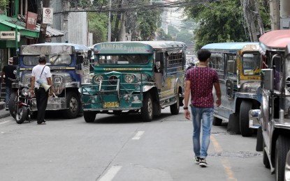 <p><strong>MORE PUJ ROUTES.</strong> Traditional public utility jeepneys (PUJs) parked along a side street in Quezon City. The Land Transportation Franchising and Regulatory Board (LTFRB) on Thursday (Oct. 22, 2020) said some 1,704 PUJs and 1,064 UV Express units will return to the streets of Metro Manila starting Sunday (October 25). (<em>PNA file photo</em>)  </p>