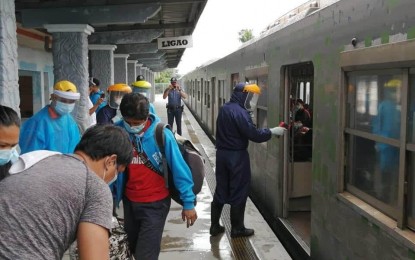 <p><strong>HOME AT LAST</strong>. At least 155 locally stranded individuals (LSIs) from Metro Manila arrived in Bicol via train through the government's “Hatid Tulong” program on Tuesday (July 28, 2020). A total of 570 LSIs from Metro Manila have been sent home to the region under the program. <em>(Photo courtesy of PMSRFU5, EDMERO Camarines Sur, Ligao CDRRMO)</em></p>