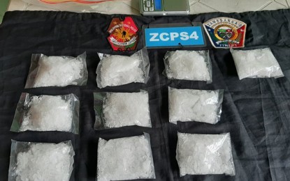 <p><strong>CONFISCATED.</strong> A team of police, Philippine Drug Enforcement Agency, and military intelligence personnel arrest Tuesday (July 28, 2020) a former overseas Filipino worker and a businesswoman in an anti-drug operation. Photo shows the PHP3.7-million worth of shabu seized from the two suspects. <em>(Photo courtesy of the Zamboanga City Police Office)</em></p>