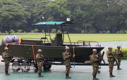 <p><strong>NEW SCOUT BOAT.</strong> The new "Scout Boat" was officially turned over on Tuesday to Special Forces Regiment (Airborne) commander, Brig. Gen. Lincoln Francisco Tagle by Army chief-of-staff Major Gen. Rowen Tolentino at the Fort Bonifacio in Taguig City. It is expected to boost the special forces regiment's counter-terrorism and HADR capabilities, especially in priority areas in Mindanao. <em>(Philippine Army photo)</em></p>