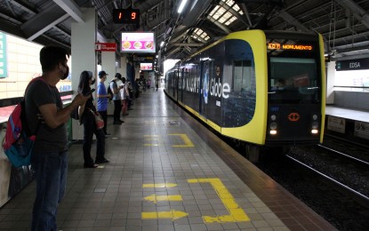 <p><strong>TEMPORARY SHUTDOWN.</strong> Passengers wait for the train at an LRT-1 station in this undated photo. Several government agencies on Wednesday (March 27, 2024) deployed free-ride buses along the route of the LRT-1 to serve passengers affected by the rail line's temporary shutdown. <em>(PNA file photo)</em></p>