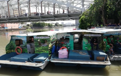<p><strong>RIVER FERRY. </strong>Several boats of the Pasig River Ferry Service moored along the banks of Pasig River. The river ferry's service resumed Friday after temporarily suspending its operations this week due to clogging caused by water hyacinths. <em>(PNA file photo)</em></p>