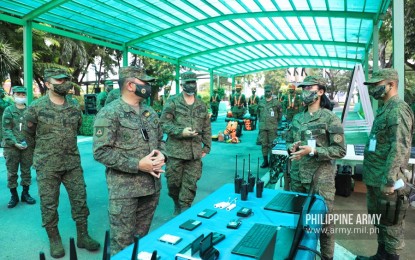 <p><strong>MOBILE COMMAND CENTER.</strong> Army commander, Lt. Gen. Gilbert Gapay (2nd from left) witnesses the signal capability demonstration of the Army Signal Regiment’s (ASR) Mobile Command Center 4 in Fort Bonifacio, Taguig City on Friday (July 31, 2020). Mobile command centers serve as coordinating venues between the Armed Forces of the Philippines and other government agencies during disasters or other crisis incidents. <em>(Photo courtesy of the Army Chief Public Affairs Office)</em></p>