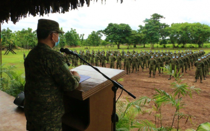 <p><strong>INSPIRING NEW SOLDIERS.</strong> Maj. Gen. Diosdado Carreon, the Army’s 6th Infantry Division chief and head of the Joint Task Force Central, speaks during the mass oath-taking of new soldiers who graduated at the 6ID Training School in Maguindanao on Friday (July 31, 2020). The new batch of soldiers, numbering 227, will be deployed to the 6ID area of coverage in Central Mindanao.<em> (Photo courtesy of 6ID)</em></p>