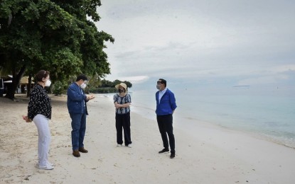 <p><strong>BOHOL 'UBE' ACCREDITATION</strong>. Governor Arthur Yap (right) chats with Tourism Secretary Bernadette Puyat (2nd right) and Interior Secretary Eduardo Año (2nd left) during an inspection of the beaches on Panglao Island, Bohol on Friday and Saturday. Yap on Monday (August 3, 2020) said Bohol will issue Ultimate Bohol Experience (UBE) seal on top of the Department of Tourism's accreditation for tourism establishments that will be allowed to open under the new normal. <em>(Photo courtesy of Bohol Provincial Capitol PIO)</em></p>
<p> </p>