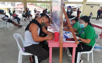 <p><strong>CASH AID</strong>. The Department of Social Welfare and Development (DSWD) conducts direct payout of the PHP5,000 emergency cash subsidy to waitlisted families in Eastern Visayas in this undated photo. The DSWD said that as of Tuesday (Aug. 4, 2020) 8,957 waitlisted families in the region have received the cash aid under the social amelioration program of the national government. <em>(Photo courtesy of DSWD)</em></p>
