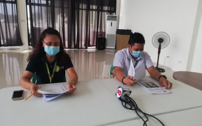 <p><strong>TWO NEW COVID-19 CASES</strong>. The Antique Integrated Provincial Health Office on Wednesday (Aug. 5, 2020) confirms two new Covid-19 cases. IPHO Health Officer I Dr. Leoncio Abiera, Jr. (right) and IPHO Information Officer Irene Dulduco (left) said the new cases were from the towns of Sibalom and San Jose de Buenavista.<em> (PNA photo by Annabel Consuelo J. Petinglay)</em></p>