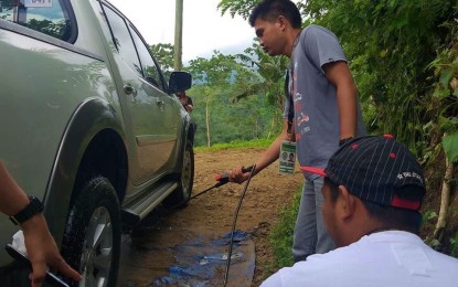 <p><strong>ASF QUARANTINE CHECKPOINT.</strong> An anti-African swine fever station disinfects a vehicle along the boundary of Magpet town and Kidapawan City, both in North Cotabato, on Thursday (Aug. 6, 2020). The provincial veterinary office has reported that the ASF infection from Magpet has reached the remote village of Lanao Kuran in Arakan town in the same province. <em>(Photo courtesy of OPVET-North Cotabato)</em></p>