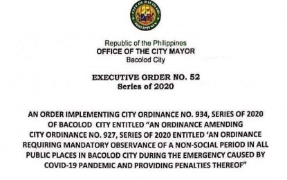 <p><strong>LONGER CURFEW HOURS</strong>. A copy of Executive Order (EO) 52, series of 2020, which enforces longer curfew hours in Bacolod City, from 8 p.m. to 4 a.m. EO 52 implements City Ordinance (CO) 934, which amended EO 927, the city’s original curfew ordinance of 10 p.m. to 4 a.m.<em> (Photo courtesy of Bacolod City PIO)</em></p>
