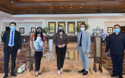 <p><strong>READY FOR 'NEW NORMAL'.</strong> The Tourism, Cultural and Historical Affairs Commission (TCHAC) of Lapu-Lapu City has paid visits to resorts and hotels in the locality to check their preparations for the reopening of the hospitality sector. TCHAC chairperson Cindi King-Chan (center) heads the delegation from the Lapu-Lapu City government in an undated photo, to check the readiness of the establishments in embracing the "new normal" amid the Covid-19 health crisis. <em>(Photo courtesy of Lapu-Lapu City PIO)</em></p>