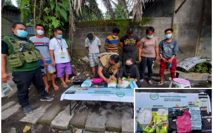 <p><strong>BUSTED.</strong> Agents of the Philippine Drug Enforcement Agency in the Bangsamoro Autonomous Region in Muslim Mindanao (PDEA-BARMM) account for the PHP13.6 million worth of suspected shabu and other items (inset) seized from five suspects (in handcuffs) during a buy-bust operation in Barangay Bago Ingud, Malabang, Lanao del Sur on Friday (Aug. 14, 2020). The PDEA-BARMM said the drug group was placed under surveillance for several weeks before the sting operation was carried out. <em>(Photo courtesy of PDEA-BARMM)</em></p>