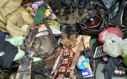 <p><strong>RECOVERED.</strong> Firearms, ammunition, and assorted provisions are among the items seized by government troops during several skirmishes with the communist New People's Army on August 13 and 14, 2020 in Sitio Mangilet, Barangay Bal-ason in Gingoog City, Misamis Oriental. Brig. General Maurito Licudine, commander of the Army's 402nd Infantry Brigade, has ordered a manhunt operation against the fleeing rebels. <em>(Photo courtesy of 402Bde)</em></p>