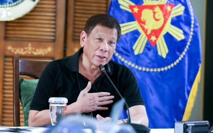 <p><strong>BACK TO GCQ.</strong> President Rodrigo Duterte delivers his public address in Davao City on Monday night (Aug. 17, 2020). Duterte approved the recommendation to place Metro Manila, Bulacan, Cavite, Laguna, and Rizal back to less stringent general community quarantine beginning Aug. 19. <em>(Photo from PCOO FB page)</em></p>