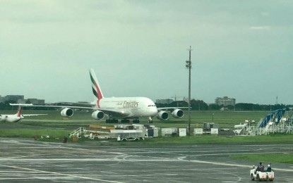 <p><strong>COMMERCIAL FLIGHT FROM DUBAI</strong>. The one-off A380 service of Emirates lands at the Clark International Airport in Pampanga on Wednesday, Aug. 19, 2020, with 405 passengers on board. The first A380 commercial aircraft to operate from Dubai to Clark aims to meet the demand for flights to and from the Philippines.<em> (Photo by Marna Del Rosario)</em></p>
