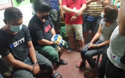 <p><strong>ARRESTED.</strong> The suspected drug dealers were nabbed in an anti-illegal drug operation Wednesday. Seized from them were some 20 kilos of shabu worth PHP136 million.<em> (PNP photo)</em></p>