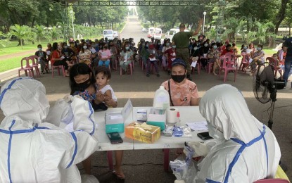 <p><strong>HATID TULONG.</strong> Some locally stranded individuals (LSIs) temporarily staying at the facility near the 'Libingan ng mga Bayani' undergo rapid testing on Wednesday (Aug. 19, 2020) in preparation for their return to their provinces Thursday. The Hatid Tulong program has resumed to ferry stranded passengers back to their home provinces.<em> (Contributed photo)</em></p>