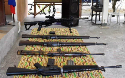 <p><strong>TURNED OVER GUNS</strong>. The four high-powered firearms turned over by the local officials of Datu Piang, Maguindanao to the Army’s 57th Infantry Battalion in support of the government’s disarmament campaign on Friday (Aug. 21, 2020). The guns included a .50-caliber Barrett sniper rifle, a Carbine rifle, and two US-made .30-caliber M1 Garand rifles.<em> (Photo courtesy of 57IB)</em></p>