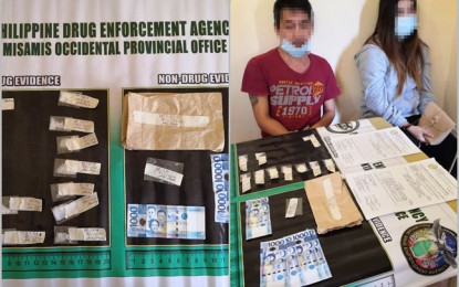<p><strong>ARRESTED.</strong> Operatives of the Philippine Drug Enforcement Agency-Region 9 and the local police arrest a "priority person of interest" and his live-in-partner in an anti-drug operation Friday in Molave, Zamboanga del Sur. The arresting team also seized from the suspects some PHP68,000 worth of suspected shabu. <em>(Photo courtesy of PDEA-9)</em></p>