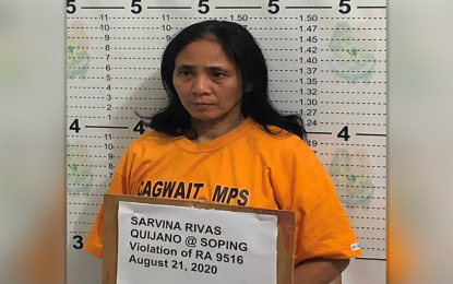 <p><strong>FINANCE OFFICER.</strong> Joint forces of the Philippine Army and Philippine National Police arrest Thursday (Aug. 20, 2020) at a checkpoint along Marihatag-Cagwait Highway in Surigao del Sur Sarvina Rivas Quijano, who is identified by a former rebel as the finance staff of the North Eastern Mindanao Regional Committee of the communist New People’s Army. The military says Quijano is the party wife of Marcelino Tampos Navarro, the NEMRC deputy secretary-general who was killed during an encounter with government forces on July 7 this year.<em> (Photo courtesy of 3SFBn)</em><br /><br /></p>
<p> </p>