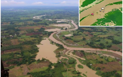 <p><strong>AERIAL VIEW</strong>. The flooded communities of North Cotabato beside the Rio Grande de Mindanao, a river that crisscrosses North Cotabato and Maguindanao provinces as viewed from above by North Governor Nancy Catamco aboard a Philippine Air Force chopper. The aerial survey gave provincial officials cognizance of the effects of natural calamities (inset) to constituents, infrastructure, and agriculture. <em>(Photo courtesy of North Cotabato PIO)</em></p>