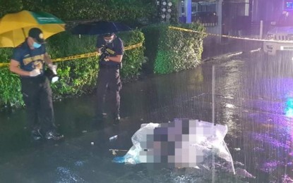 <p><strong>CRIME SCENE</strong>. Scene of the crime operatives of Bacolod City Police Office process the area where human rights activist Zara Alvarez was gunned down in Eroreco Subdivision, Barangay Mandalagan on the night of Aug. 17, 2020. The Police Station 3 is still conducting an investigation, which has drawn full support from the Philippine Army. <em>(File photo courtesy of Bacolod City Police Office)</em></p>