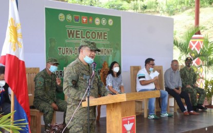 <p><strong>TIMELY SURRENDER</strong>. Brig. Gen. Maurito L. Licudine, commander of the Army's 402nd Infantry Brigade, welcomes the 174 New People’s Army (NPA) members and supporters from the provinces of Agusan del Norte and Agusan del Sur who opted to return to the fold of the law, in a ceremony on Aug. 20, 2020. He said their surrender greatly complemented the efforts of the RTF-ELCAC in the area in bringing development interventions in remote villages and communities. <em>(Photo courtesy of 402Bde)</em></p>
