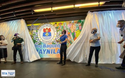 <p>Manila Mayor Francisco ‘Isko Moreno’ Domagoso leads the inauguration of the newly renovated Lagusnilad underpass on Monday (Aug 24, 2020). He also unveiled a mural which has a semblance of the Botong Francisco painting at the Bulwagan of the Manila City Hall depicting the rich history of the country. <em>(Photo from Manila PIO)</em></p>