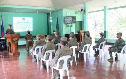 <p><strong>SPECIALIZED TRAINING</strong>. Lt. Col. Jo-ar Herrera, commander of the Army's 53rd Infantry Battalion (on the podium), addresses the 8th batch of soldiers during the opening of the Small Unit Leadership Training Class 01-2020 in Camp Sabido, Guipos, Zamboanga del Sur on Sunday (Aug. 23, 2020). The training aims to prepare the troops to be ready to “face any circumstances” while on mission. <em>(Photo courtesy of the 53IB)</em></p>