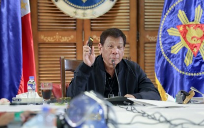 <p><strong>NO MAGIC BULLET.</strong> President Rodrigo Roa Duterte talks to the people after holding a meeting with the Inter-Agency Task Force on the Emerging Infectious Diseases (IATF-EID) core members at the Matina Enclaves in Davao City on August 24, 2020. Duterte said there is no “magic bullet” to solve the coronavirus disease 2019 (Covid-19) pandemic as he sought for more patience until a vaccine is made available. <em>(Presidential photo by Robinson Niñal Jr.)</em></p>