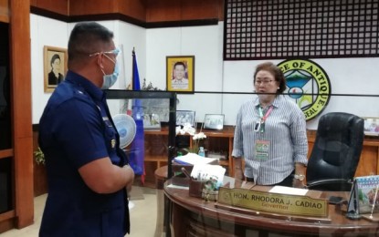 <p><strong>COURTESY CALL</strong>. Newly installed Philippine Coast Guard - Antique Station Commander, Lt. Noel Ramos (left), calls on Antique Governor Rhodora J. Cadiao at her office at the Provincial Capitol on Tuesday (Aug. 25, 2020). Cadiao requested the PCG to help curb rampant illegal fishing in the province. <em>(PNA photo by Annabel Consuelo J. Petinglay)</em></p>