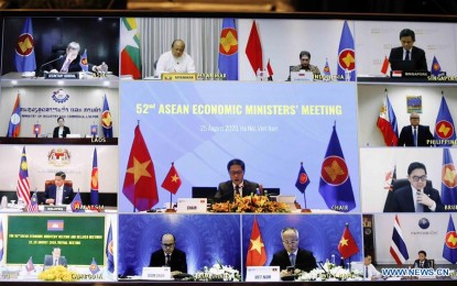 <p><strong>RESPONSE TO COVID-19.</strong> Delegates attend the 52nd Asean Economic Ministers’ Meeting via video conference in Hanoi, Vietnam on Aug. 25, 2020. The Asean economic ministers discussed the response to and recovery from the coronavirus disease 2019 pandemic and its impacts.<em> (VNA via Xinhua)</em></p>