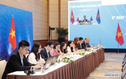 <p><strong>RCEP MEETING.</strong> People attend the 8th Regional Comprehensive Economic Partnership Ministerial Meeting via video conference in Hanoi, Vietnam on Aug. 27, 2020. Economic ministers of the 10 Association of Southeast Asian Nations members and from China, Japan, South Korea, Australia, and New Zealand on Thursday underscored the significance of the RCEP in post-Covid-19 pandemic recovery. <em>(VNA via Xinhua)</em></p>