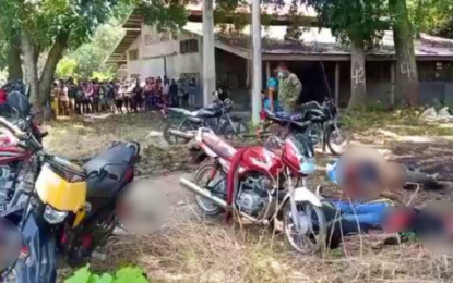 <p><strong>MURDERED.</strong> The bodies of the Kabacan shooting victims sprawl by the side of the road at the back section of the University of Southern Mindanao in Kabacan, North Cotabato following their murder by still unidentified attackers on Saturday (Aug. 29, 2020). The provincial police formed a special task group to hasten the investigation of nine victims in the incident that reports said were flagged down by five armed men before they were gunned down for still unknown reasons. <em>(Photo courtesy of DXND – Kidapawan)</em></p>