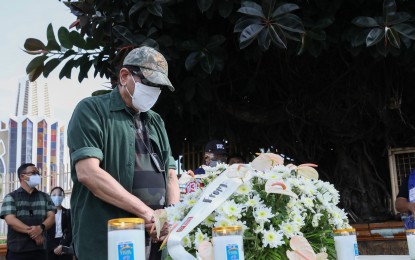 <p><strong>SHOW OF RESPECT.</strong> President Rodrigo Roa Duterte leads the candle-lighting and the offering of flowers at the blast site at Barangay Walled City in Jolo, Sulu on August 30, 2020. The twin explosions killed at least 14 people, including seven soldiers and a police officer, and injured 77 others. <em>(Presidential photo by Karl Norman Alonzo)</em></p>