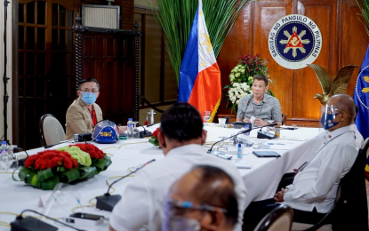 <p><strong>RESHUFFLE</strong>. President Rodrigo Roa Duterte talks to the people after holding a meeting with the Inter-Agency Task Force on the Emerging Infectious Diseases (IATF-EID) core members at the Malago Clubhouse in Malacañang on August 31, 2020. Duterte ordered the reshuffling of the Philippine Health Insurance Corp. (PhilHealth) and Bureau of Customs (BOC). <em>(Presidential photo by King Rodriguez)</em></p>