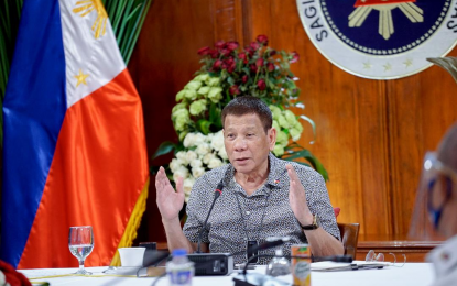 <p><strong>TALK TO THE PEOPLE.</strong> President Rodrigo Roa Duterte talks to the people after holding a meeting with Inter-Agency Task Force on the Emerging Infectious Diseases (IATF-EID) core members at the Malago Clubhouse<em> </em>Malacañang Palace on Monday night (Aug. 31, 2020). Duterte placed Iligan City under modified enhanced community quarantine while Metro Manila, Batangas, Bulacan, Bacolod City and Tacloban City under general community quarantine. <em>(Presidential photo by King Rodriguez)</em></p>
<p> </p>