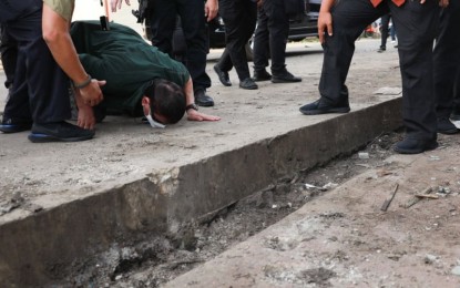 <p><strong>HONOR, RESPECT.</strong> President Rodrigo Duterte kisses the ground of Jolo, Sulu blast site on Sunday (Aug. 30, 2020), showing respect and honor to the fallen soldiers and those civilians who were victims of the twin bombing on August 24. The bombings killed 17 people, including state security forces. <em>(Photo courtesy of Senator Bong Go)</em></p>