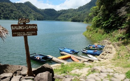 <p><strong>LOCKDOWN</strong>. The picturesque Balinsasayao Twin Lakes Natural Park in Negros Oriental is under lockdown after a nurse who tested positive of Covid-19 visited the area recently. The nurse, a provincial government employee, roamed around in several areas even before her swab test result came out last week. (<em>PNA photo by Judy Flores Partlow</em>) </p>