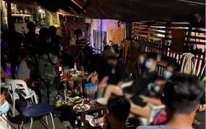 <p><strong>QUARANTINE PARTY BUSTED. </strong>A total of 16 persons were arrested  at a birthday celebration on Barangay Lower Bicutan for violating quarantine protocols on Saturday (Sept. 12, 2020). This is the first quarantine violation acted upon by the police since the activation of the JTF Covid Shield's Facebook page on September 11. <em>(Photo courtesy of JTF Covid Shield)</em></p>