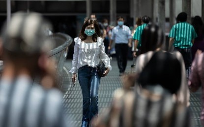 <p>A woman wears a face mask as a preventive measure against the coronavirus pandemic in Madrid, Spain on Sept. 16, 2020. Several regions in Spain are considering tightening restrictions as new coronavirus infections continued to accelerate on Wednesday, with the Health Ministry reporting nearly 11,200 new daily cases. <em>(Anadolu photo)</em></p>